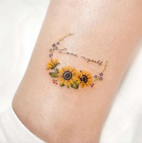 Sunflower Positivity Tattoo, Small Sunflower Tattoo On Ankle, Sunflower And Gerber Daisy Tattoo, Sunflower Tattoo Designs For Women, Small Memorial Tattoos Sunflower, Sunflower With Words Tattoo, Sunflower Family Tattoo, Watercolor Sunflower Tattoo Forearm, Double Sunflower Tattoo