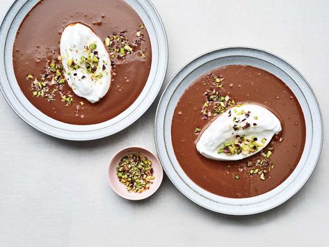 These Floating Islands with Dark Chocolate Crème Anglaise and Toasted Pistachios from chef Gabriel Kreuther are meltingly tender and rich. Get the recipe at Food & Wine. Classic French Desserts, French Dessert Recipes, Pistachio Recipes, Floating Islands, Best Chocolate Desserts, Chocolate Creme, Floating Island, French Dessert, French Desserts