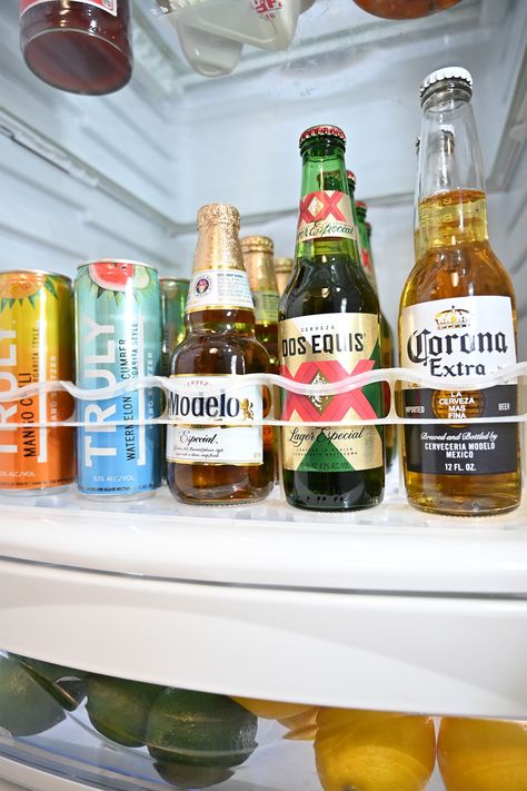 Tidy up those fallen over bottles while you clean out your fridge today! Great for everyday beverage organization and for hosting! Get your Fridge-Plus on Amazon! #happynationalcleanyourfridgeoutday #finditonamazon Alcohol Fridge, Beverage Organization, Stocked Fridge, Kitchen Hacks Organization, Tidy Up, Organization Hacks, Kitchen Organization, Beer Bottle, Clean Out