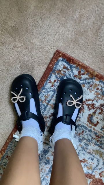 Rheanna ʚ❤︎ɞ on Instagram: "Mary Jane shoes but has in crocs 🤔💭🖤 
The socks just makes them more cuter found a 3 pack on @amazon 
Everything is link in my LTK in bio 🔗

#grwm #outfitinspo #outfitideas #outfitinspiration #ootd #ootdfash #hsstyle #outfitoftheday #streetwear #autumnoutfits #autumnfits #fallshoestrends #autumnootd #maryjane #crocs

Crocs, maryjaneshoes, bow croc charm, ruffle socks, black crocs, fall shoes," Mary Jane Crocs Outfit, Crocs Outfit Fall, Mary Jane Crocs, Mary Jane Outfit, Crocs Mary Jane, Crocs Outfit, Ruffle Socks, Black Crocs, Mary Jane Clogs