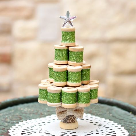 Turn tiny wooden spools into an adorable miniature Christmas tree ornament! Fun project to make and to display. I Sheep Ornaments, Wooden Spool Crafts, Miniature Christmas Tree, Spool Crafts, Wood Spool, Ornaments Homemade, Diy Christmas Tree Ornaments, Miniature Christmas Trees, Wooden Spools