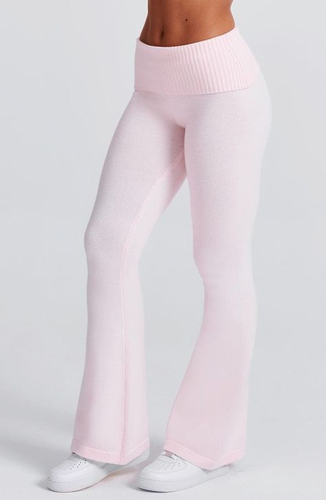 The Portia Knit Pants are a must-have for any wardrobe. These versatile pants feature a flattering fit and flare silhouette, with a wide rib waistband for added style. Complete the look with the matching Portia knit hoodie.     Colour: Pink.  Regular length.  Unlined.  Fit and flare silhouette.  Wide 2x2 rib waistband.  Fold over waistband detail.  Internal elastic in waistband.  Model is an XS and is wearing an XS.   Size: XS, S, M, L, XL, XXL Things For Wishlist, Pink Workout Pants, Waffle Pants Outfit, Pink Christmas List, Pink Outfit Board, Pink Boho Outfit, Shops To Buy Clothes, Cute Clothes To Buy, Christmas Wishlist Items