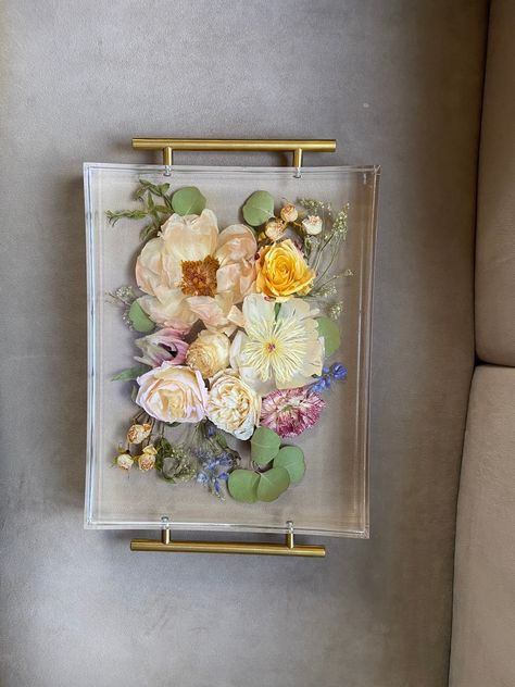 "PLEASE MESSAGE FIRST TO CHECK AVAILABILITY. Resin tray with dry or pressed flowers is 14x11x2\" acrylic tray with a lip and beautiful gold handles, is a beautiful addition to your home decor, a beautiful display piece with your special flowers. Flowers will be flat in pressed flower tray and will take 1/2\"-1\"layer of resin and will have more higher lip. Dry flower tray takes whole dried flowers and is beautiful to look at 3D flowers of your bouquet. It takes up to 2\" of resin and may or may Flower Resin Tray, Diy Resin Flowers, Flower Tray, Wedding Bouquet Preservation, Flowers Resin, Floral Preservation, Flower Shadow Box, Bouquet Preservation, Memorial Flowers