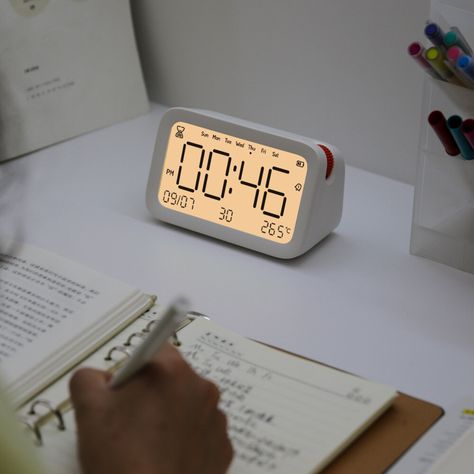 Behold the specifics of this modern and functional Alarm Clock. Engineered with precision, this state-of-the-art accessory measures 100mm in diameter and 1300mm in length. Crafted from high-grade plastic, the design is trendy yet functional, perfect for contemporary decor. This advanced Alarm Clock comes with an easy-to-navigate Snooze function, allowing for those precious extra few minutes of sleep. What’s more, it possesses a Sleep with Backlight attribute, ensuring you never struggle to Digital Desk Clock, Study Timer Clock, Digital Alarm Clock Aesthetic, Room Accessories Aesthetic, Futuristic Clock, Alarm Clock Aesthetic, Digital Clock Design, Office Objects, Digital Table Clock