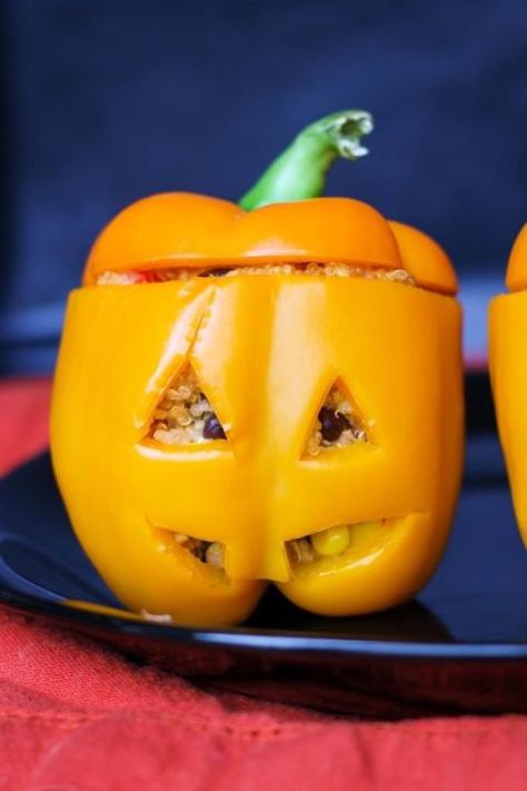 Stuffed Jack-O-Lantern Peppers - Delish.com Jack O Lantern Peppers, Party Food Vegetables, Bell Pepper Tacos, Halloween Main Dish, Halloween Stuffed Peppers, Pepper Tacos, Vegetable Appetizers, Roasted Red Pepper Sauce, Easy Halloween Food