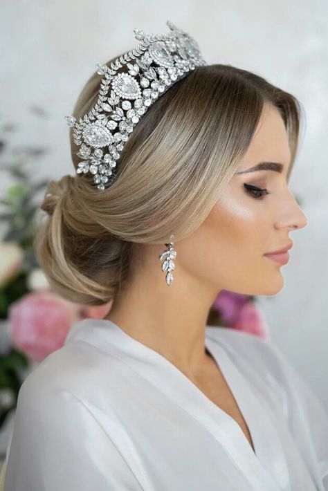 Wedding Hair Updo With Crown, Low Bun Bridal Hair With Crown, Bridal Hair Updo With Tiara, Bridal Updo With Crown And Veil, Wedding Updo With Crown, Bridal Updo With Crown, Volume Updo Wedding, Wedding Updo With Tiara, Bride Hairstyles With Tiara