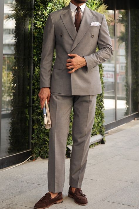 Make an entrance with our Grey Double-Breasted Suit 2-Piece. Crafted for the modern gentleman, this ensemble, complete with a 4-button blazer, peak lapels, and functioning buttoned cuffs, embodies a perfect blend of classic elegance and contemporary style, ensuring you stand out with confidence and flair at any formal event. #greysuit #formalstyle #suits #mensfashion #specialoccasion #sophisticatedstyle #formalattire #dapper #doublebreasted #formaloutfit Double Breasted Suit Groom, Grey Double Breasted Suit Men, Mens Dress Shoes Guide, Double Breasted Suit Men, Grey Suit Men, Suit Styles, Double Breasted Tuxedo, Men's Business Outfits, Suit Stores