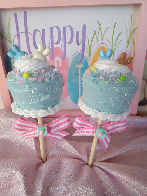 "💗MY PROMISE TO MY CUSTOMERS:  If you are not delighted, I'll refund your purchase price! 💗 These adorable Easter cupcake pops will be so cute for any display!   Incorporate them into an Easter basket display,  wreath, or stand them in a small cup or jar. Cute basket topper! The cupcake is the size of a small cupcake with sprinkles and faux candies on top.  The exposed stick measures ~ 4.25\" long. Cute attached bow with fake candy embellishment. Fake Cake - for display only.  Made of all non-edible materials.   Please keep away from small children and pets. Please note:  I only ship to the contiguous United States (lower 48 states)." Fake Bake Easter, Fake Cakes For Display Diy, Joann Barrandey, Cupcake Pops, Fake Baking, Cupcake With Sprinkles, Faux Desserts, Clay Easter, Basket Display