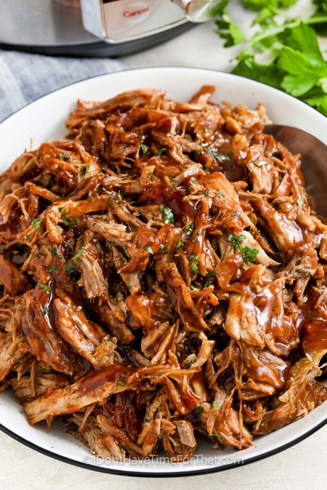 Make this recipe for pulled pork in the Instant Pot and enjoy the taste of tender slow-cooked meat in less than than an hour! Flavorful pork shoulder is pressure cooked in the Instant Pot with a tangy homemade BBQ sauce, then shredded and piled on a plate or slider bun. Even the toughest pork roast cooks up tender and juicy in the Instant Pot. #pulledporkintheinstantpot #idonthavetimeforthat #bbqpulledporkinstantpot #instantpotpulledporkrecipe Pork Shoulder Roast Instapot, Instant Pot Pork Shoulder Roast Bone In, Shredded Pork Tenderloin Instant Pot, Instant Pot Pork Loin Pulled Pork, Pulled Pork Instant Pot Frozen, Insta Pot Pulled Pork Recipes, Pressure Cooker Pork Shoulder, Pull Pork Instant Pot Recipe, Pork Roast Pressure Cooker Recipes