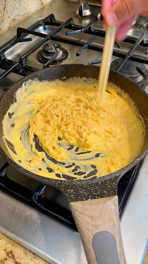 How to Make Cheese Ramen Noodles: TikTok's Favorite Recipe Ramen Noodles Cheese, Sticky Ramen Noodles, Ramen Noodle Mac And Cheese, Cheesy Samyang Noodles, Ramen Recipes Cheese, Cheese Roman Noodles, Creamy Roman Noodles, Ramen Mac And Cheese, Creamy Cheesy Ramen Noodles