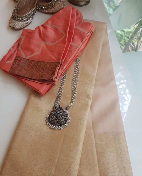 No photo description available. Cream Color Saree, Cream Saree, Plain Sarees, Saree Accessories, Saree Blouse Styles, Cotton Saree Blouse Designs, Cotton Blouse Design, Cotton Saree Blouse, Cotton Saree Designs