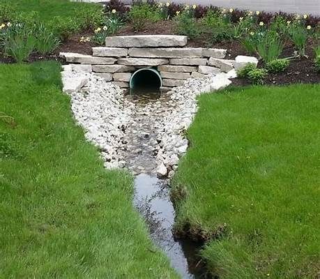 30 Smart Driveway Culvert Ideas That Can Boost Your Landscape Culverts Ideas, Ditch Ideas, Driveway Culvert, Limestone Gravel, Driveway Entrance Landscaping, Landscape Drainage, Landscaping A Slope, Drainage Ditch, Narrow Garden