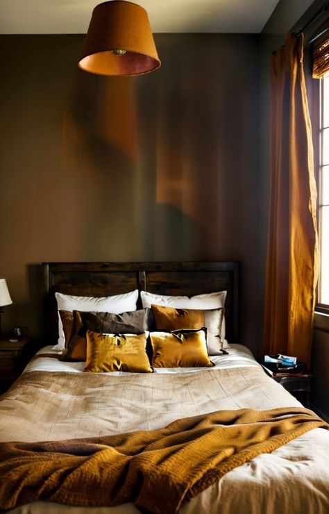 Create a cozy autumnal atmosphere in your bedroom by painting the walls in warm earth tones like burnt orange or deep brown. Add rustic elements such as wooden furniture and soft textiles in shades of rust, mustard, and olive to complete the cozy look. Mustard Bedroom, Bedroom Orange, Deep Autumn, Orange Walls, Deep Brown, Soft Textiles, Wooden Furniture, Earth Tones, Burnt Orange