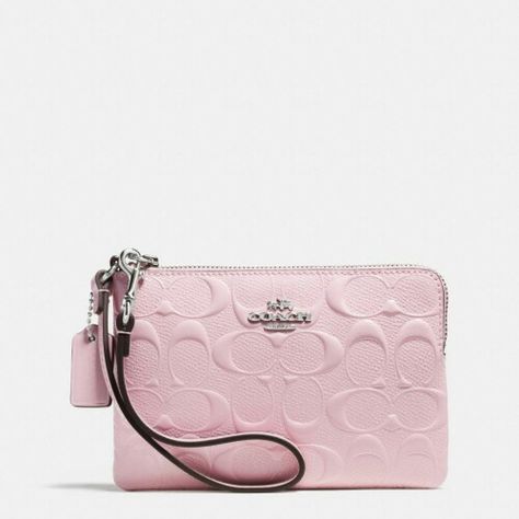 Coach signature embossed baby pink wristlet. My Style Bags, Luxury Bags Collection, Pink Wristlet, Handbag Essentials, Cute Wallets, Girly Bags, Luxury Purses, Fancy Bags, Girly Accessories