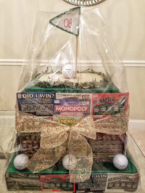 By Majestic Designs & Creations For a charity golf tournament. Golf Auction Basket, Golf Tournament Basket Ideas, Golf Fundraiser Basket Ideas, Golf Outing Raffle Baskets, Golf Tournament Giveaway Ideas, Golf Tournament Silent Auction Items, Golf Themed Basket, Golf Tournament Raffle Baskets, Golf Tournament Sponsor Ideas