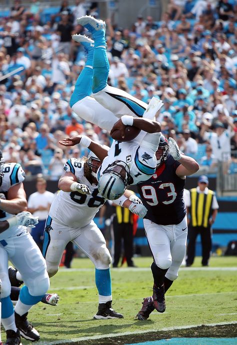 It's a bird! It's a plane! It's...CAM NEWTON?! Yes, in Week 2 Cam rushed for an epic TD against the Houston Texans that involved this 360-degree flip-and-score. (Paul Spinelli via AP) Nfl Photography, Tuff Nfl Pics, Funny Nfl Memes, Carolina Panthers Football, Nfl Meme, Cam Newton, Panthers Football, Nfl Fantasy Football, Football Photography