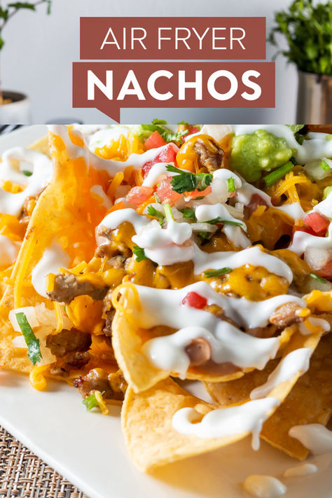 Can you air fry nachos? Absolutely! These air fryer nachos with ground beef are piled high with all the delicious toppings: shredded cheese, refried beans, pickled jalapeños, and pico de gallo salsa. Discover everything you need to create the ultimate loaded nachos, choose the healthiest nacho chips, and more! This is one air fryer snack recipe you won’t want to miss! #healthyrecipes #airfryer #nachos #glutenfree #easysnacks #easymeals Air Fryer Chicken Nachos, Airfryer Nachos, Nachos With Refried Beans, Nachos With Ground Beef, Fry Nachos, Air Fryer Nachos, Fried Jalapenos, Healthy Nachos, Baked Nachos