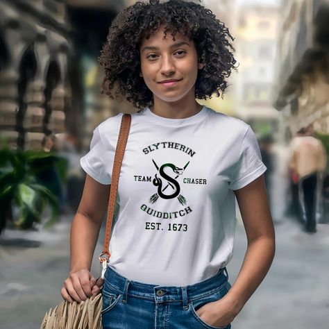 Slytherin Team Chaser Quidditch EST.1673 Shirt Check more at https://teecharis.com/product/slytherin-team-chaser-quidditch-est-1673-shirt/ Chaser Quidditch, Slytherin Quidditch Team, Slytherin Quidditch, Hogwarts Quidditch, Harry Potter Slytherin, Team Shirt, Disney Shirt, Team Shirts, Hogwarts