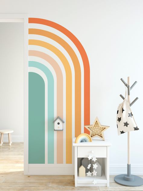 Wall Decals For Playroom, Rainbow Paint On Wall, Half Rainbow Wall Mural, Pastel Colors Painting Ideas, Toy Room Wall Paint Ideas, Daycare Wall Colors, Rainbow Accent Wall Paint, Playroom Rainbow Wall, Corner Rainbow Wall