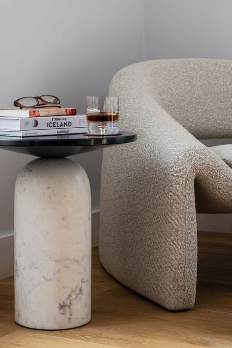 Close-up of our cozy corner with the Sacha Performance Bouclé Armchair from @castleryus and the Martini Side Table from @cb2. 🍸✨ Designed by VUUE, this table’s gunmetal top and white marble base make cocktail hour a must! What’s your go-to spot for a cozy read? #InteriorDesign #CozyCorner #ModernCoastal #MomoInteriorDesign Boucle Armchair Living Room, Scituate Ma, Boston Interiors, London Apartment, Virtual Design, Arm Chairs Living Room, Modern Coastal, Cozy Corner, Cocktail Hour