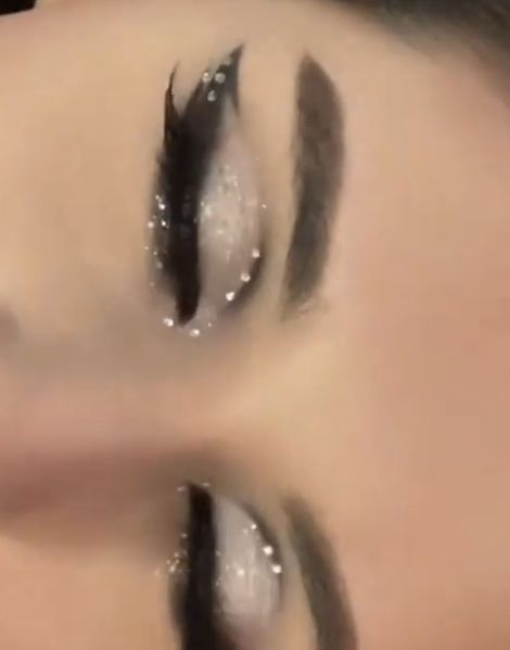 Black Glitter Prom Makeup, Makeup With Star Glitter, Black Sparkle Eye Makeup, Black Elegant Makeup, Black Glittery Eyeshadow, Dark Makeup With Glitter, Silver Makeup Looks With Rhinestones, Black N White Makeup, Cute Black Eyeshadow Looks