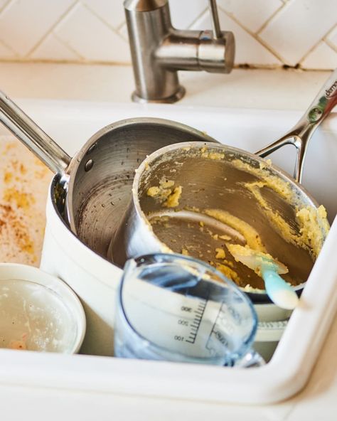 Sink full of dirty dishes. Dirty Dishes In Sink, Dishes In Sink, Clean Greasy Kitchen Cabinets, Cleaning Burnt Pans, Kitchen Soffit, Dishwasher Tablets, Clean Pots, Kitchen Gear, Clean Plates