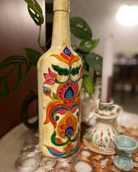 Bottle painted with glass colours, but not using the transparent effect. . . . #paintedbottles #upcycledglassbottle #homedecorideas #sustainablelifestyle #upcycledcrafts #fevicrylhobbyideas #bottleartlovers #bottleart #reuse #reduce #tabledecor Upcycled Crafts, March 27, Bottle Painting, Sustainable Lifestyle, Bottle Art, Glass Bottles, Colored Glass, Table Decorations, Glass