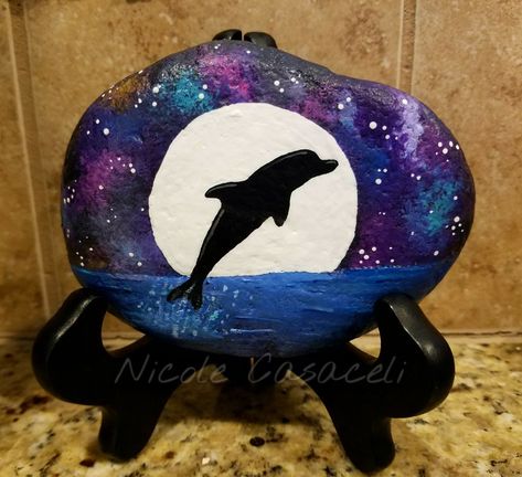 Dolphin silhouette painted rock  #paintedrocks #kindnessrocks Dolphin Painted Rocks, Dolphin Pebble Art, Dolphin Rock Painting, Positivity Rocks, Dolphin Silhouette, Art Turtle, Dolphin Painting, Rock Painting Tutorial, Happy Stones