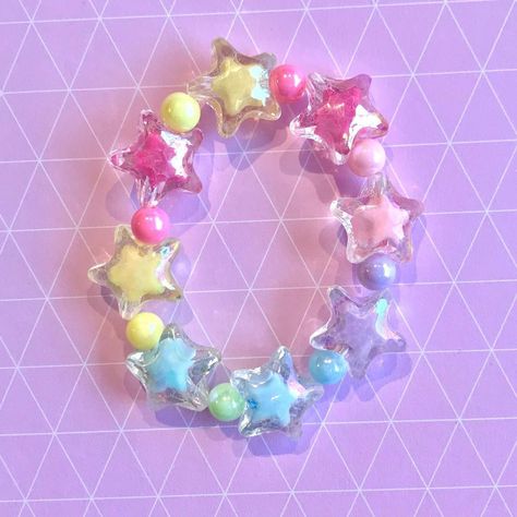 Made this for my depop shop @/shona_parker a while ago 💖 There are currently lots of kawaii beads for sale on there, perfect for making friendship and kandi bracelets, and I hope to add some more kawaii bracelets for sale on there soon. #harajuku #kawaii #kawaiijewellery Beaded Jewelry Kawaii, Kawaii Friendship Bracelet, Kawaii Kandi Bracelets, Cutecore Bracelet Ideas, Decora Bracelet, Cute Kandi Bracelets, Harajuku Bracelet, Decora Jewelry, Kawaii Bracelets