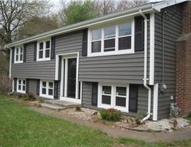 Raised Ranch Exterior, Split Foyer Remodel, Raised Ranch Remodel, Engineered Wood Siding, Siding Ideas, Siding Repair, Raised Ranch, Gray House Exterior, Exterior House Renovation