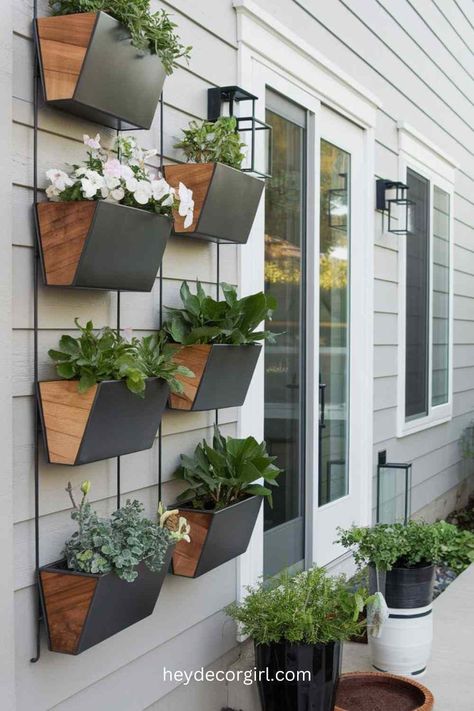 20 Small Front Porch Decorating Ideas - Hey Decor Girl [Latest Trending Decor Design Ideas] Back Deck Plant Ideas, Small Front Porch Decorating Ideas, Cozy Front Porch Ideas, Front Porch Decorating Ideas, Wall Mounted Planters, Small Front Porch, Porch Decorating Ideas, Vertical Planter, Cozy Rugs