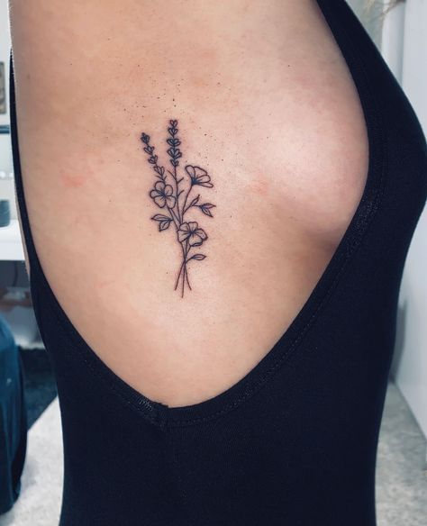 Small Floral Rib Tattoo, Dainty Wildflower Tattoo Ribs, Wildflower Tattoo Side Rib, Rib Placement Tattoos, Flower Tattoos On Side Rib Cage, Flower Tattoos Side Ribs, Flower Tattoo With Date, Flower Ribcage Tattoo, Flower Bouquet Tattoo Ribs