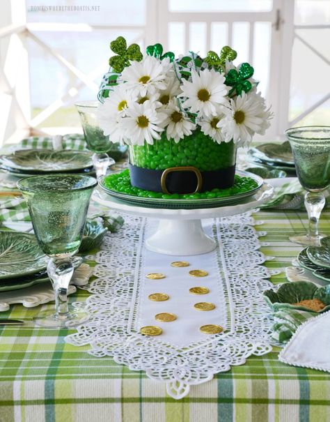 Leprechaun Hat Centerpiece DIY for St. Patrick's Day using candy and flowers | ©homeiswheretheboatis.net #StPatricksDay #centerpiece #DIY #leprechaunhat #tablescape Sant Patrick, St Patricks Decorations, Edible Centerpieces, St Patricks Crafts, San Patrick, Leprechaun Hats, St Patrick's Day Decorations, Saint Patties, St Pats