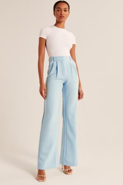 Trending: Blue is About to Take Over Your Closet | The Everygirl How To Fold Pants, Iron Pants, Casual Pants Women, Light Blue Pants, Trendy Trouser, Casual Wide Leg Pants, Tailored Pants, Type Of Pants, Blue Pants