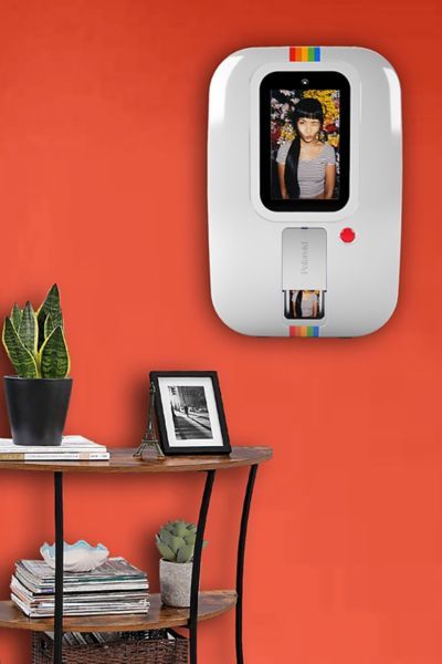 Make memories with this compact, at-home photo booth and instant printer by Polaroid. Features touch screen operation and prints to ZINK sticker film with a variety of effects and filters built-in. Quick sharing generates a QR code to transfer between devices. Plug-in.Features. At-home photo booth with instant printer 10” touch screen Built-in filters Hang on door or stand tabletop 16GB internal storage Micro SD slot Quick share feature Plug-in Content + Care. Includes photo booth, power supply, Instant Printer, Instant Photo Booth, Polaroid Photo Booth, Polaroid Photo Booths, Instant Photo, Technology Photos, Polaroid Photo, Instant Photos, Polaroid Photos