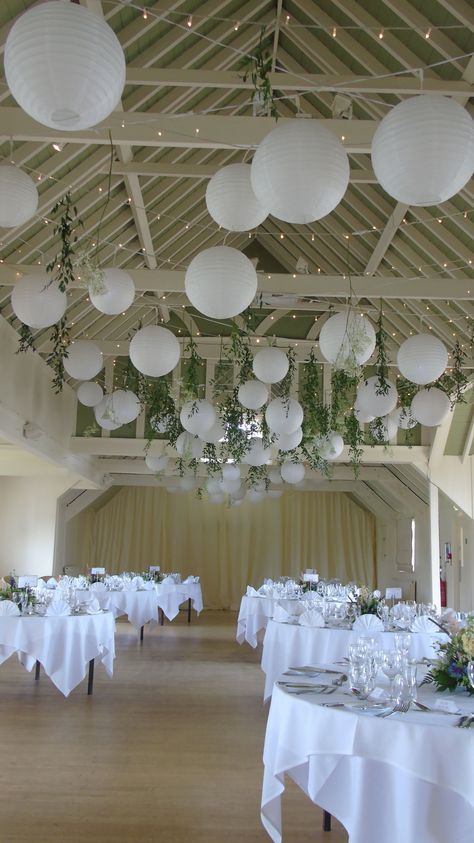 White Paper Lanterns Decor, White Lanterns Decor, How To Decorate Ceiling For Wedding, Paper Lanterns Hanging From Ceiling, Wedding Paper Lanterns Hanging, Hanging Decor Wedding Ceilings, Lantern Ceiling Wedding, White Lantern Wedding Decor, Wedding Easy Decorations