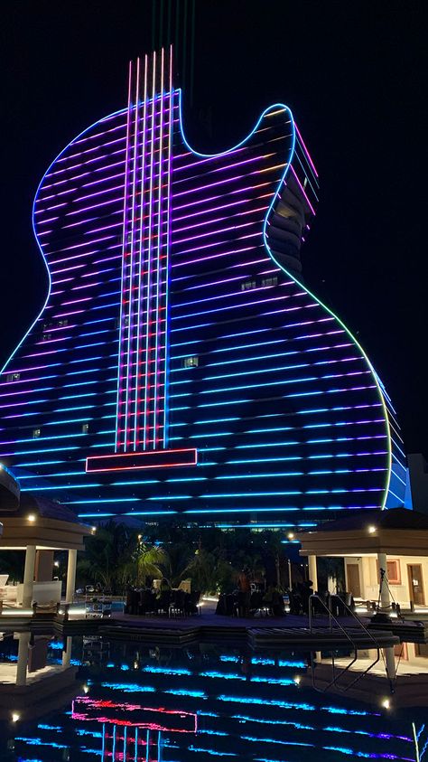 Seminole Hard Rock Hotel & Casino, Hollywood, USA — urdesignmag Rooftop Lighting, Sicilian Decor, Hard Rock Casino, Facade Lighting, Lucky 7, Hard Rock Hotel, Car Upholstery, Amazing Buildings, Toy Art