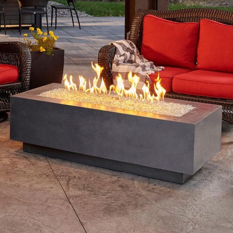 Cove 54 Inch Rectangular Glass Fiber Reinforced Concrete Natural Gas Fire Pit Table in Midnight Mist by The Outdoor GreatRoom Company (Ships As Propane w/ Natural Gas Conversion Kit). CV54MMDSING. Fire Pit Tables. Made in the USA with domestic and imported parts.
This 54 inch Cove Collection linear gas fire pit table is the perfect addition to any contemporary outdoor space. The Midnight Mist Supercast concrete lets the focus be on the stunning Crystal Fire Plus burner. The organic nature of the Fire Pit Lights, Contemporary Fireplace Decor, Concrete Outdoor Kitchen, Contemporary Fire Pit, Grandma House, Glass Fiber Reinforced Concrete, Outdoor Cooking Spaces, Natural Gas Fire Pit, Fire Pit Lighting