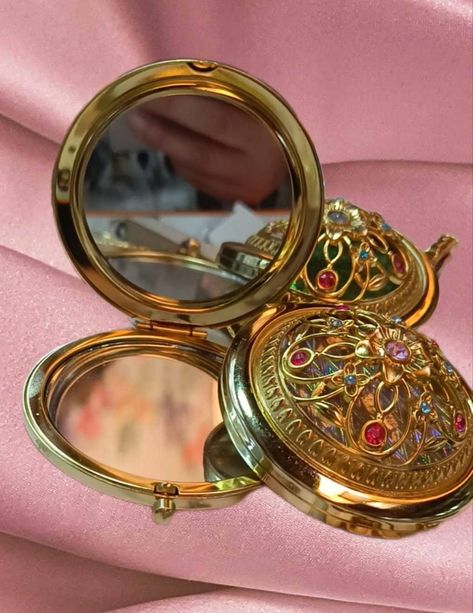 This metal floral designed compact cosmetic mirror is functional and stylish accessory fot your vanity set. ITEM FEATURES *Portable for on-the-go makeup touch-ups or checking your appearance, *Durable and long-lasting ,providing protection for the mirror inside and making it resistant to wear and tear, *Small and lightweight which means easy to carry in your purse,pocket or make-up bag, *One regular and one magnifying mirror for overall reflection while the magnifying mirror is great for close-up work, like applying makeup or tweezing, *Hinged designed allowing to be propped open at different angles for hands-free use, *Decorative accents including metal wrapping,floral patterns and opal stones on the outer casing adding to their visual appeal, *Simple cleaning regularly with a gentle glas Antique Pocket Mirror, Compact Mirror Rose, Vintage Pocket Mirror, Cute Pocket Mirror, Pocket Mirror Aesthetic, Bridal Shower Mirror, Mirror Favors, Metal Wrapping, Mirror Purse