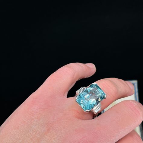 We love our Aquamarines, and now that they’ve become precious gems, there is a very good reason to invest in a piece, as they’ll continue to go up in value.🥰 This circa 1930’s Art Deco Aquamarine and Diamond ring, is set with a 19ct emerald cut Aquamarine of a good medium colour with a greenish undertone 🤩 and very good clarity, in 18K white gold. We love the colour on this Aquamarine. On the stepped shoulders, we have four bezel set baguette cut Diamonds totalling 0.79ct. This ring is c... Blue Mountains Australia, Emerald Cut Rings, Emerald Engagement Ring Cut, Baguette Cut Diamond, Aqua Marine, Art Deco Engagement Ring, Go Up, Baguette Cut, Art Deco Ring