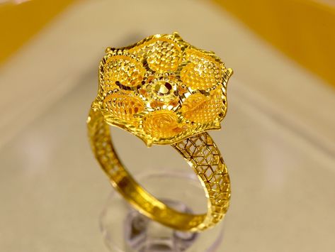 22K Solid Gold Turkish Filigree Flower Ring For Her * Material   : 22K Yellow Gold. Real Gold Jewelry, not plated * Ring Size : US Size 7 (Customizable to any US standard sizes) * Weight     : 4.78 grams of Solid 22K Gold. * Origin      : Dubai, United Arab Emirates AUTHENTICITY * All items are hallmarked from Dubai to ensure the specified purity. PACKAGING * All items are nicely packaged and ready to gift in elegant jewelry boxes. INSURANCE * Your item is fully insured. You don't need to worry Turkish Rings, 22k Gold Ring, Real Gold Jewelry, Dubai United Arab Emirates, Gold Filigree, Plated Ring, Arab Emirates, Rings For Her, Jewelry Boxes