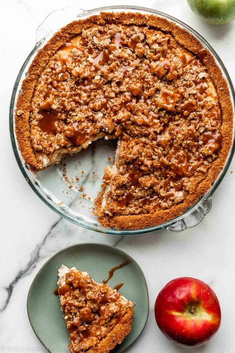 Smooth and creamy brown sugar cheesecake on top of a crisp, sweet graham cracker crust and topped with cinnamon apples, salted caramel, and brown sugar streusel. This is like caramel apple pie and cheesecake in 1! Dessert recipe on sallysbakingaddiction.com November Baking, Apple Cheesecake Pie, Apple Pie Cheesecake, Apple Treats, Baking Challenge, Salted Caramel Apple Pie, Caramel Apples Homemade, Coconut Cheesecake, Caramel Apple Cheesecake