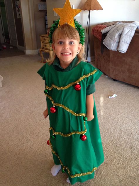 Christmas tree costume for my daughter Christmas Tree Outfit Kids, Diy Christmas Tree Costume For Kids, Dress Up Like A Christmas Tree Kids, Diy Christmas Tree Costume, Dress Like A Christmas Tree For School, Christmas Tree Costume Kids, Christmas Tree Shirt Diy, Christmas Tree Costume Diy, Christmas Character Costumes