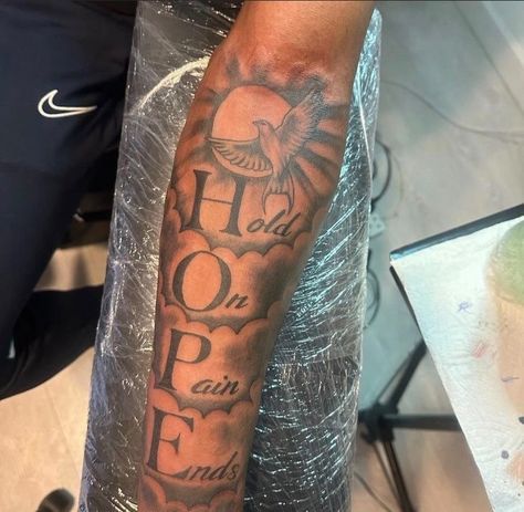 H.o.p.e Tattoo, Pain Tatoos Ideas, Back Of Forearm Tattoo, Arm Tattoos Black, Memorial Tattoo Ideas, Arm Tattoos For Guys Forearm, Word Tattoo Ideas, Tattoo Ideas Males, Black Men Tattoos