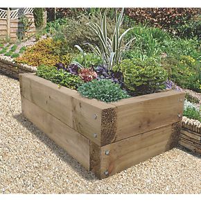 Order online at Screwfix.com. Contemporary raised bed. Features landscaping sleepers secured with coach bolts for solid construction and a rustic appearance. Holds approximately 220Ltr of compost. Attractive, chunky sleeper construction which suits any garden style and is suitable for growing a wide variety of plants. Easy to assemble. FREE next day delivery available, free collection in 5 minutes. Raised Beds Sleepers, Sleepers In Garden, Raised Planter Beds, Raised Flower Beds, Wooden Planter, Dog Garden, Garden Solutions, Raised Planter, Forest Garden