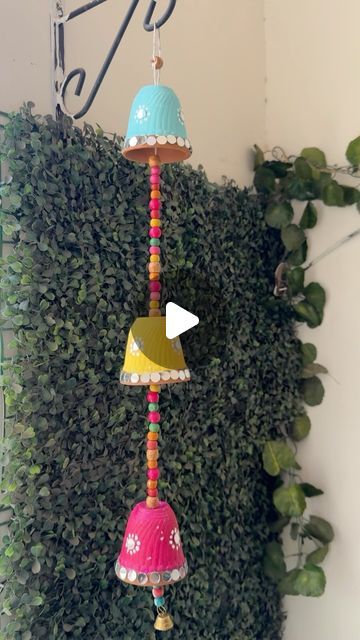 Indu Sharma on Instagram: "DIY Wall Hanging using Kulhad ✨
This stunning wall hanging adds so much color and vibrancy to any space, making it an ideal piece of Indian traditional decor. Here’s how you can make a beautiful wall hanging in no time:
1.Soak terracotta pieces to prepare them.
2.Drill a hole beneath each piece for hanging.
3.Apply a coat of gesso to create a smooth painting surface.
4.Use three vibrant colors to paint your design.
5.Decorate with mirrors for added sparkle.
6.String the pieces together with wooden beads.
.
.
.
.
.
#diy #diydecor #craft #craftideas #wallhanging #easydiy #terracotta" Diy With Kulhad, Traditional Wall Art Indian, Decorate With Mirrors, Wooden Beads Diy, Smooth Painting, Indian Diy, Beautiful Wall Hanging, Traditional Wall Art, Wall Hanging Diy