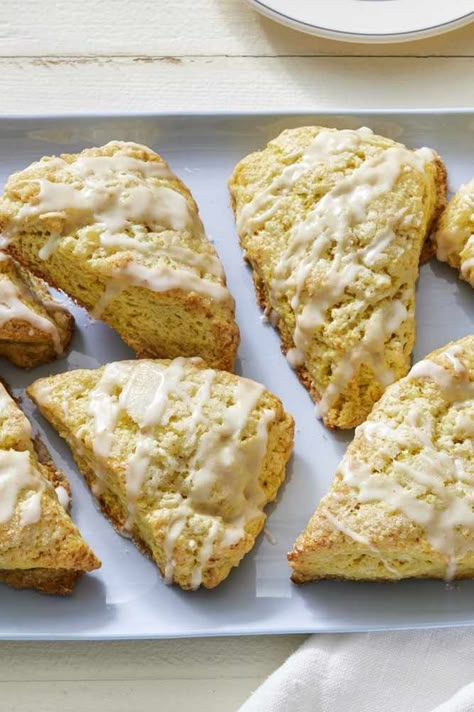 Our lemon scone recipe is easy to make. These rich, flaky scones are packed with lemon flavor and finished with a simple lemon glaze. #easylunchrecipes #familydinner #familyfriendlyrecipes #marthastewart #recipeideas #recipes #weeknightdinners Martha Stewart Lemon Scones, Easy Lemon Scones, Lemon Glaze For Scones, Lemon Cream Scones, Lemon Scones Recipe Easy, Lemon Ginger Scones Recipe, Honey Scones, Sweet Scones Recipe, Flaky Scones