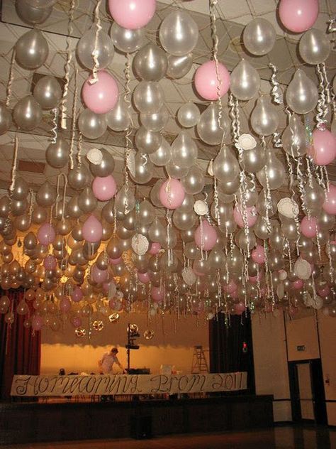 doilies, ribbon, balloons loooots of work CC: It looks like they hung some kind of netting from the ceiling. (?) Not sure if we could pull this off, but I like the effect. Maybe clusters of balloons on the floor would work. 21st Birthday Hall Decorations, 18th Birthday Hall Decorations, Prom Hall Decoration, Balloons Hanging From Ceiling Birthday, Hall Party Decorations, Hall Party Ideas, Balloon Hanging From Ceiling, Hall Decoration Ideas Party, Party Hall Decor Ideas