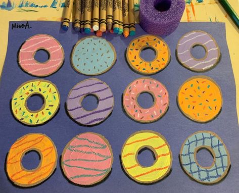 @iheartchoiceart on Instagram: “I finally got around to buying a pool noodle to use for donut prints! These were fun to do but lots of drying time between steps. Stamped…” Dough Disco Activities, D For Donut Craft, Donut Painting Ideas, Dozens Of Doughnuts Activities, Wayne Thiebaud Donut Art Lesson, Donut Pool, Donut Art, Black Crayon, Pool Noodles