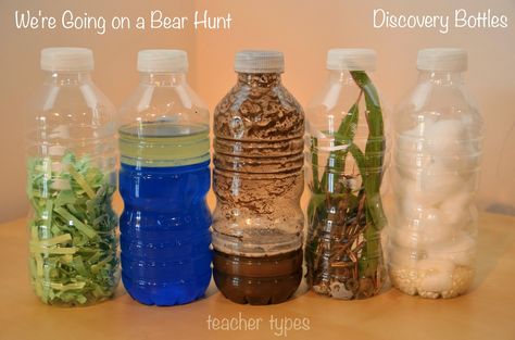 We're Going on a Bear Hunt sensory bottles and other book inspired play ideas Going On A Bear Hunt Sensory, Bear Hunt Sensory Bottles, Animal Sensory Bottles, Going On A Bear Hunt Activities, Going On A Bear Hunt, Discovery Bottles, Michael Rosen, Story Sack, Prop Box